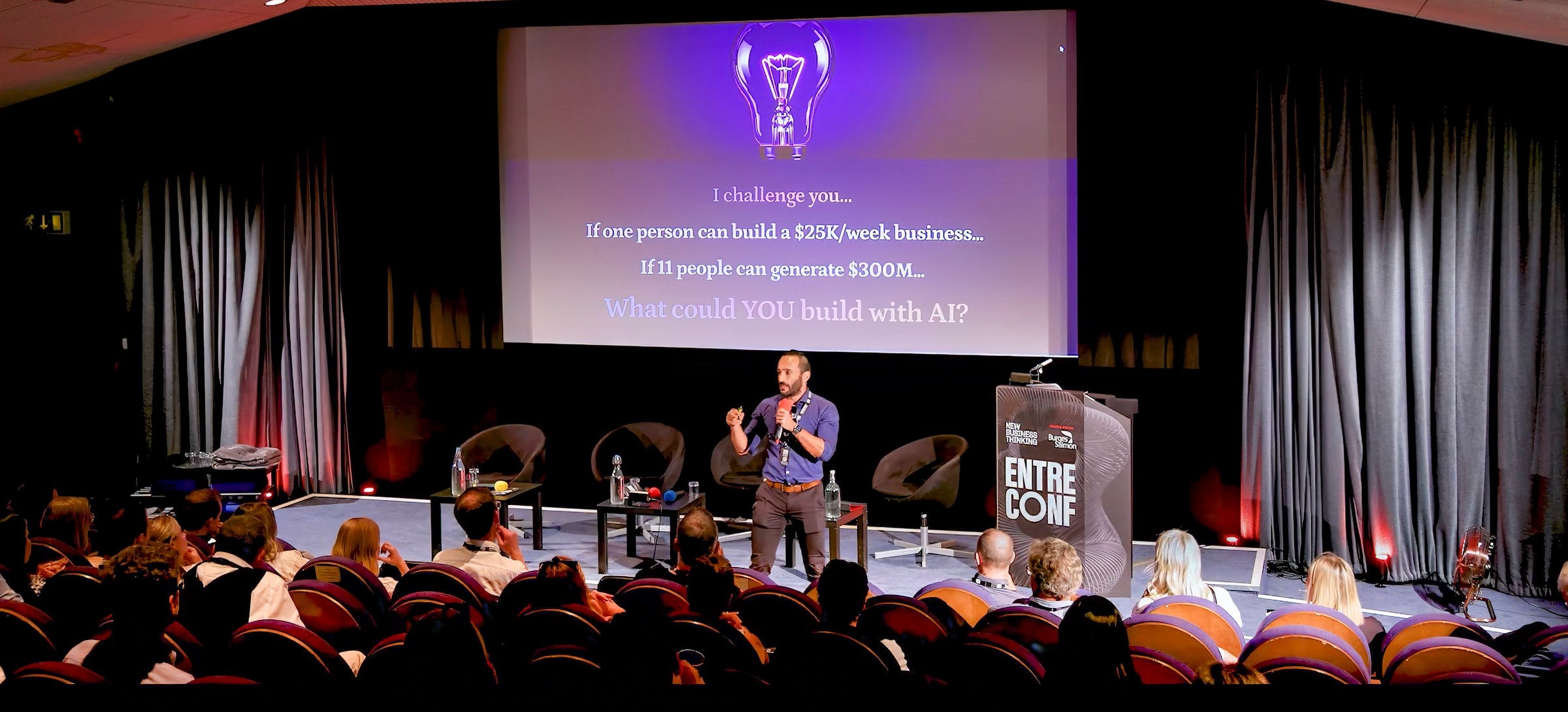 Bruno speaking to a full auditorium at EntreConf